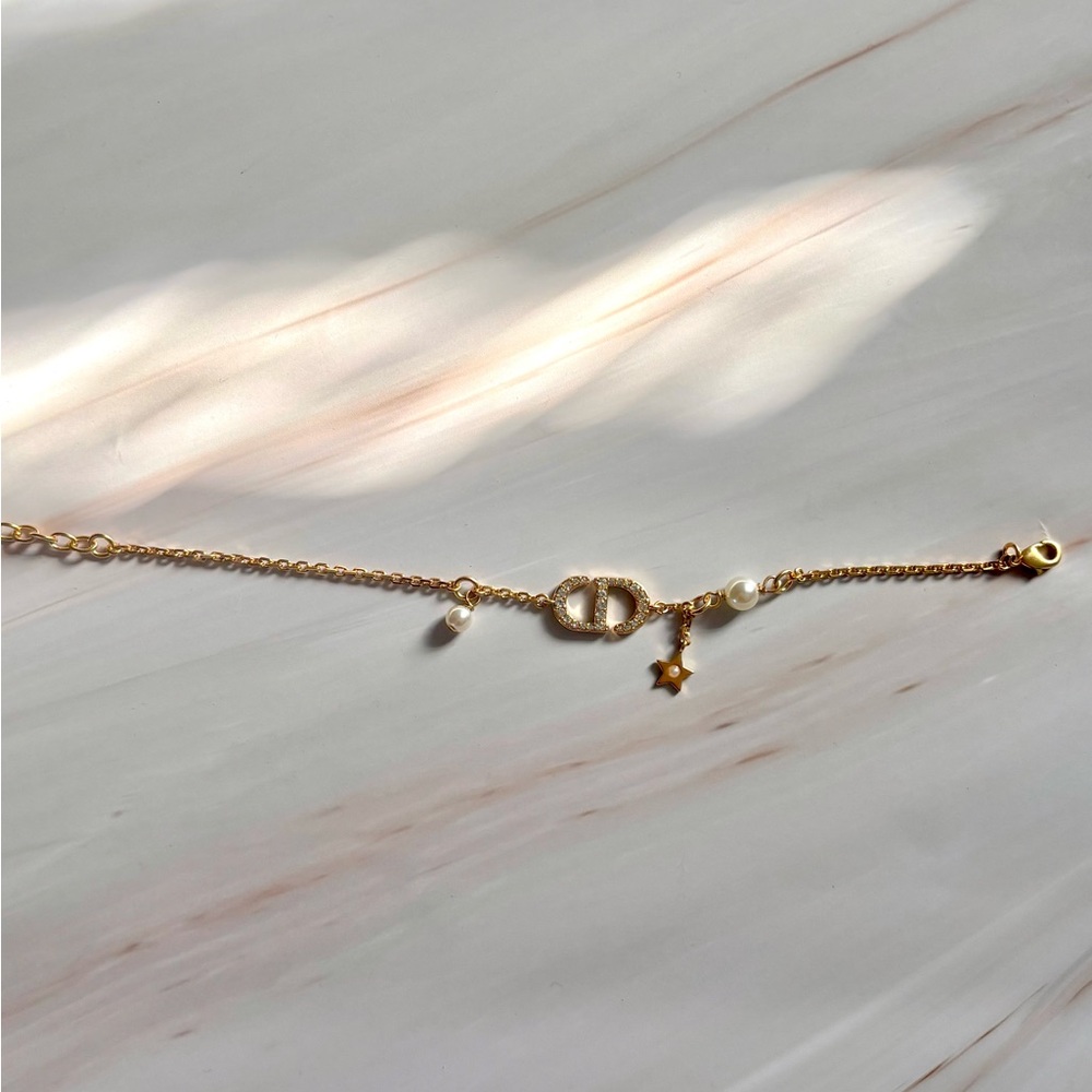 Christian Dior Crystal & Resin Pearl Petit CD Charm Gold Bracelet - Picture 3 of 5
